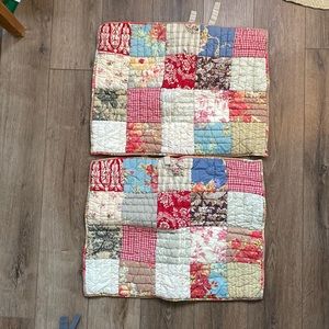 Quilted pottery barn pillow shams.